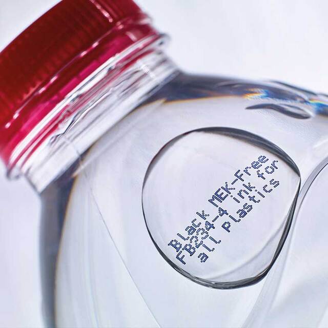 CIJ printed label on the side of a mineral water bottle