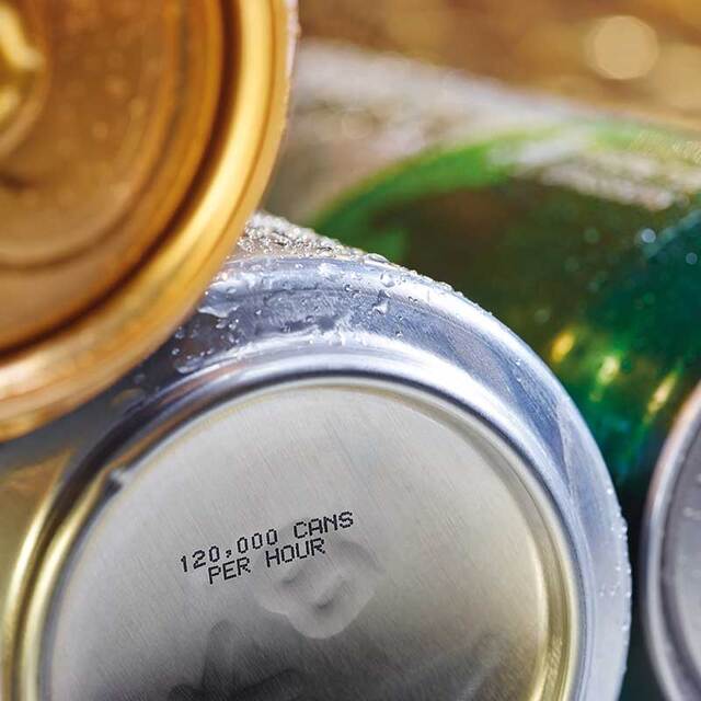 CIJ printed label on the bottom of an aluminium soda can