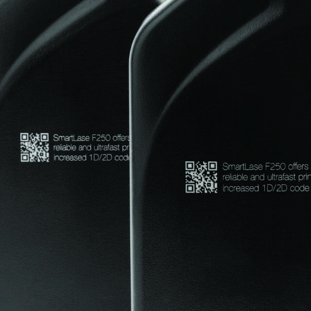 Laser marked labels on a dark leather surface