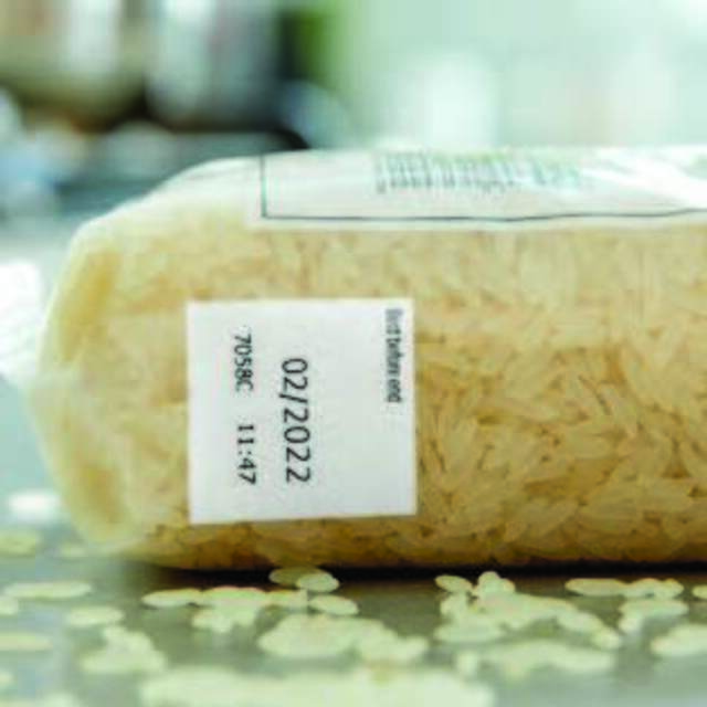 Printed expiry date labels on rice plastic packaging