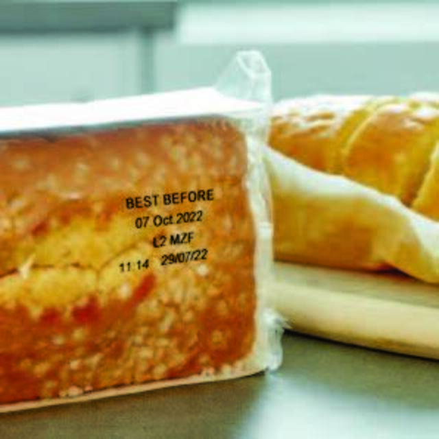 Printed expiry date labels on bread wrapped in plastic packaging