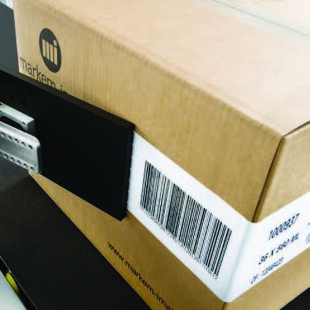 Applied label on both edges of a cardboard box